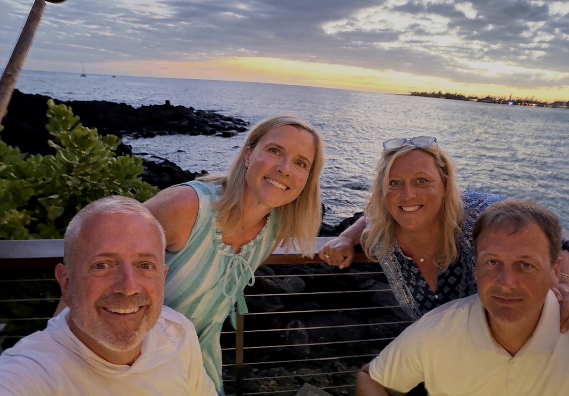 Josh and Mike with family by the ocean